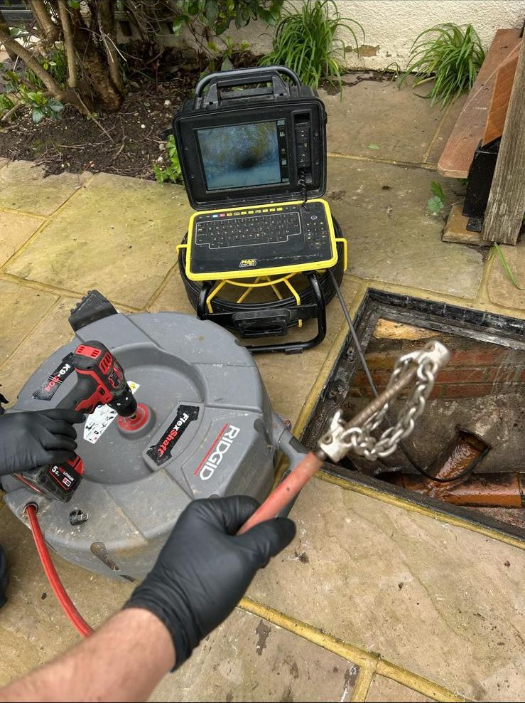 Drain unblocking with reel and CCTV in Croydon