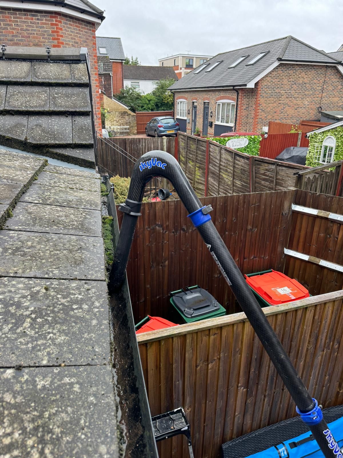 Gutter before and after clearing with vacuum system